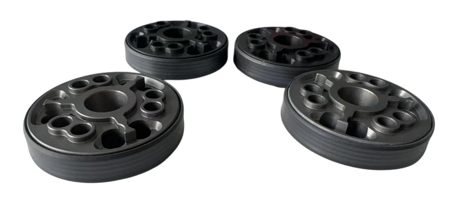 CNC-machined shock absorber pistons manufactured by BIB Parts